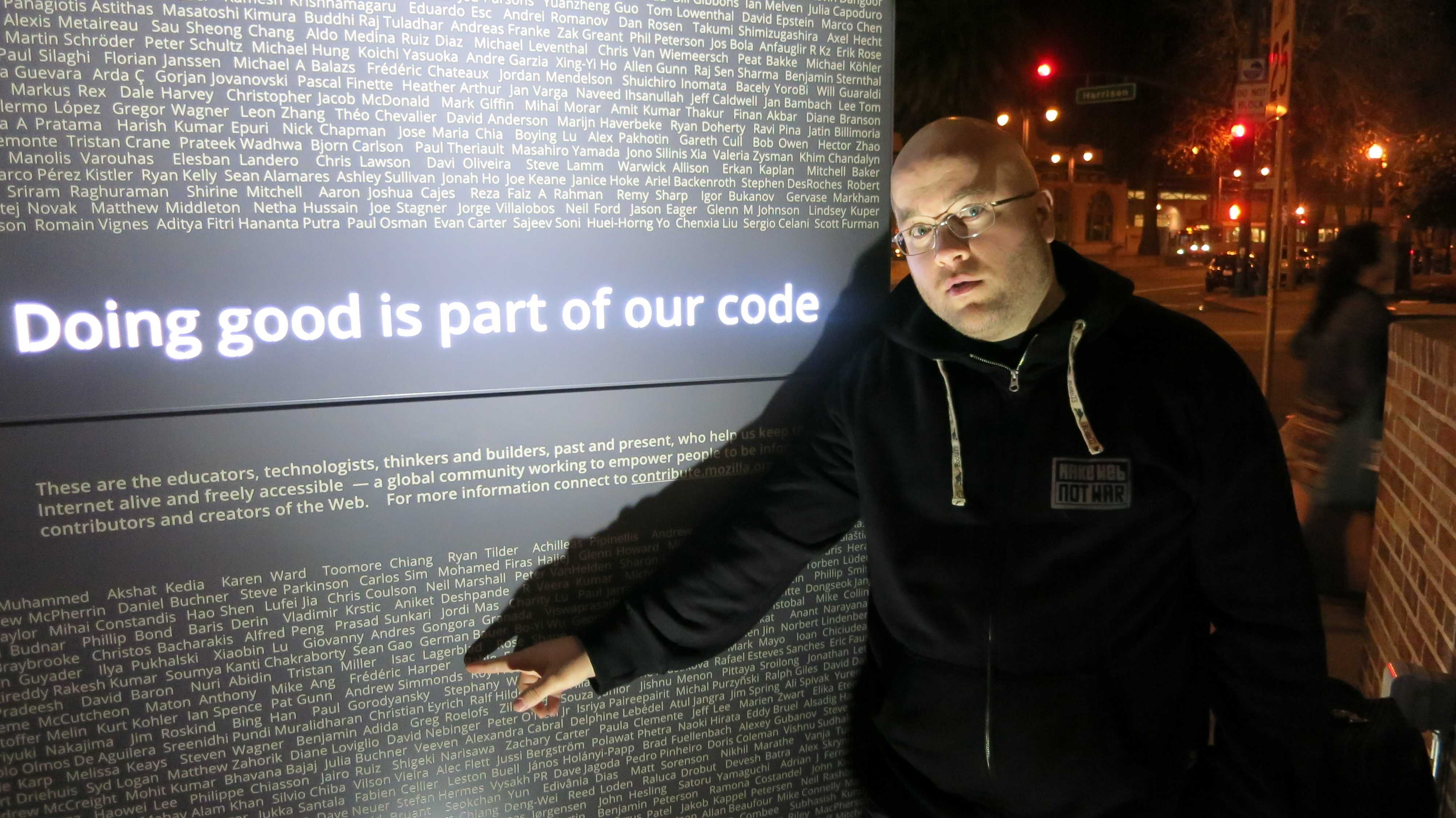 Myself pointing my name on the Mozilla recognition statue