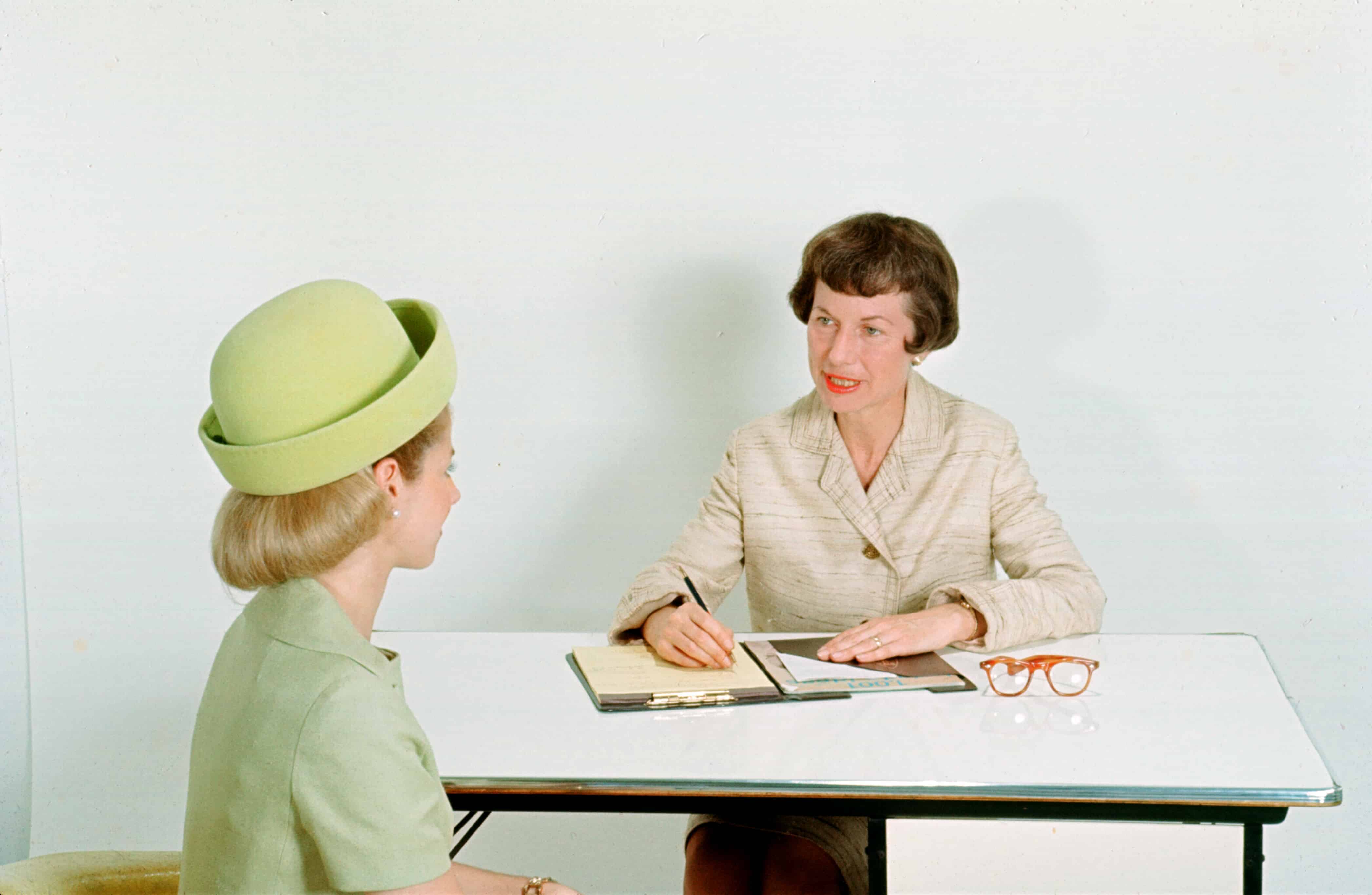 a woman interviewing another woman