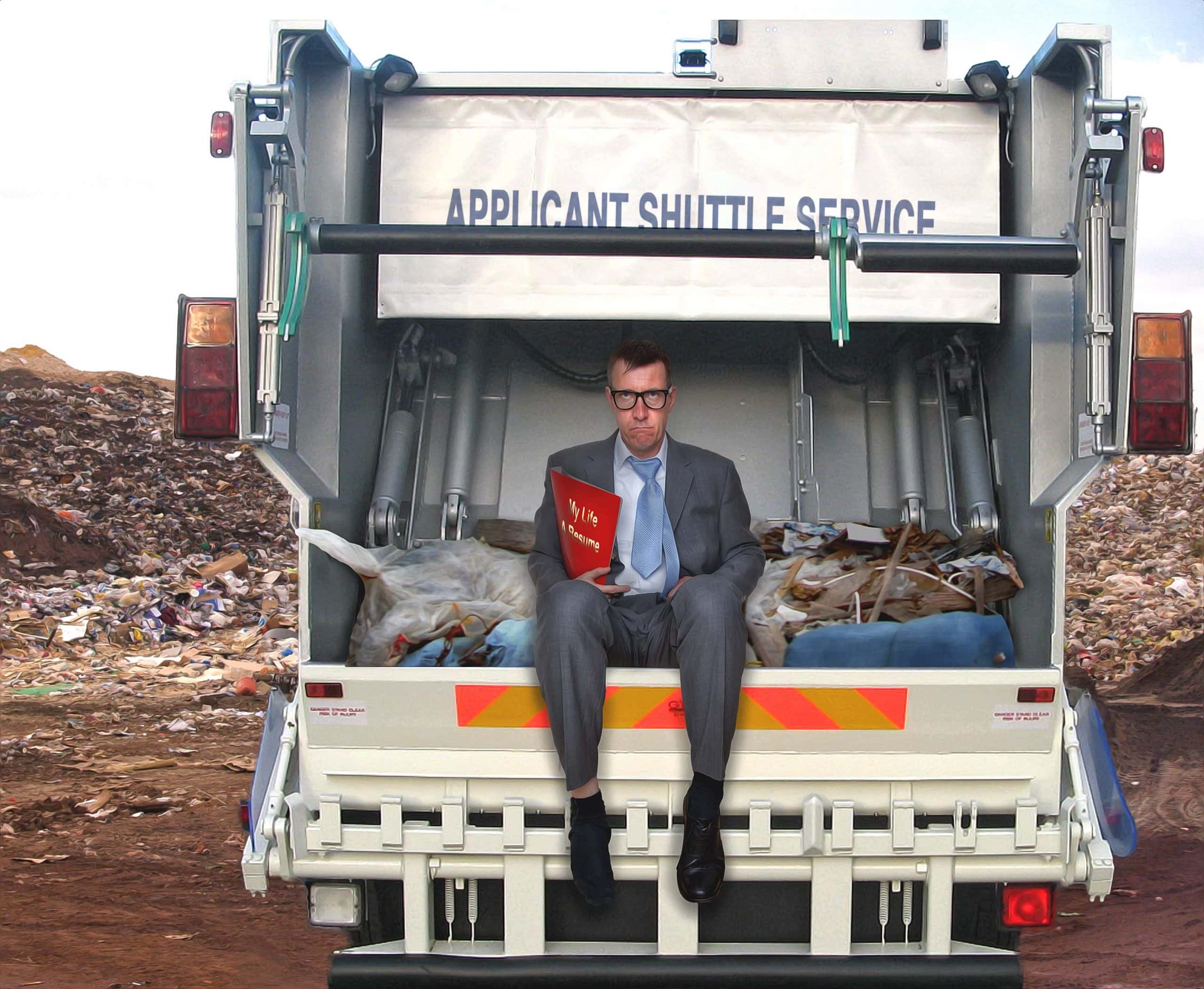 Man sitting in a garbage truck