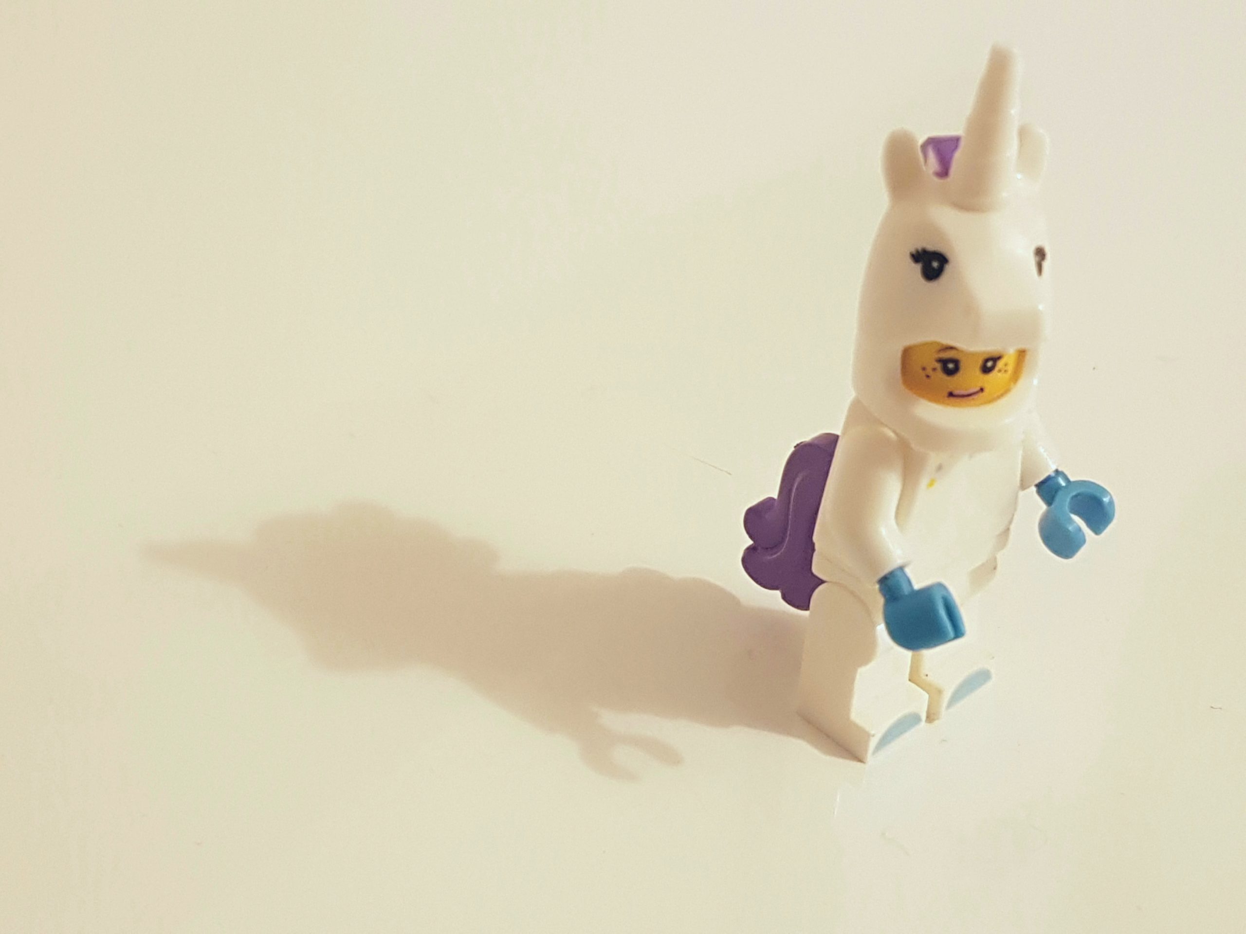 A lego in an unicorn costume