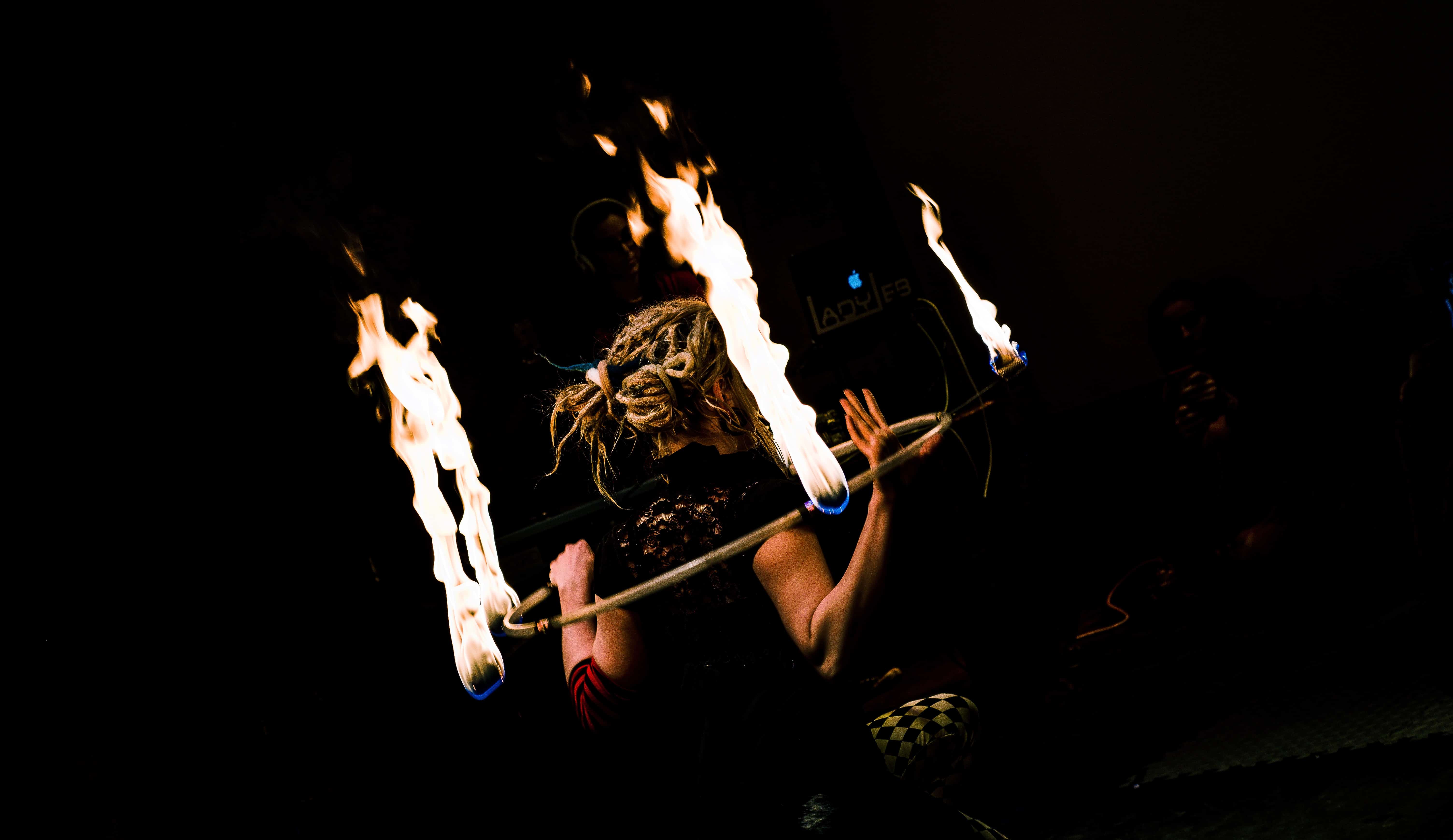woman playing with fire
